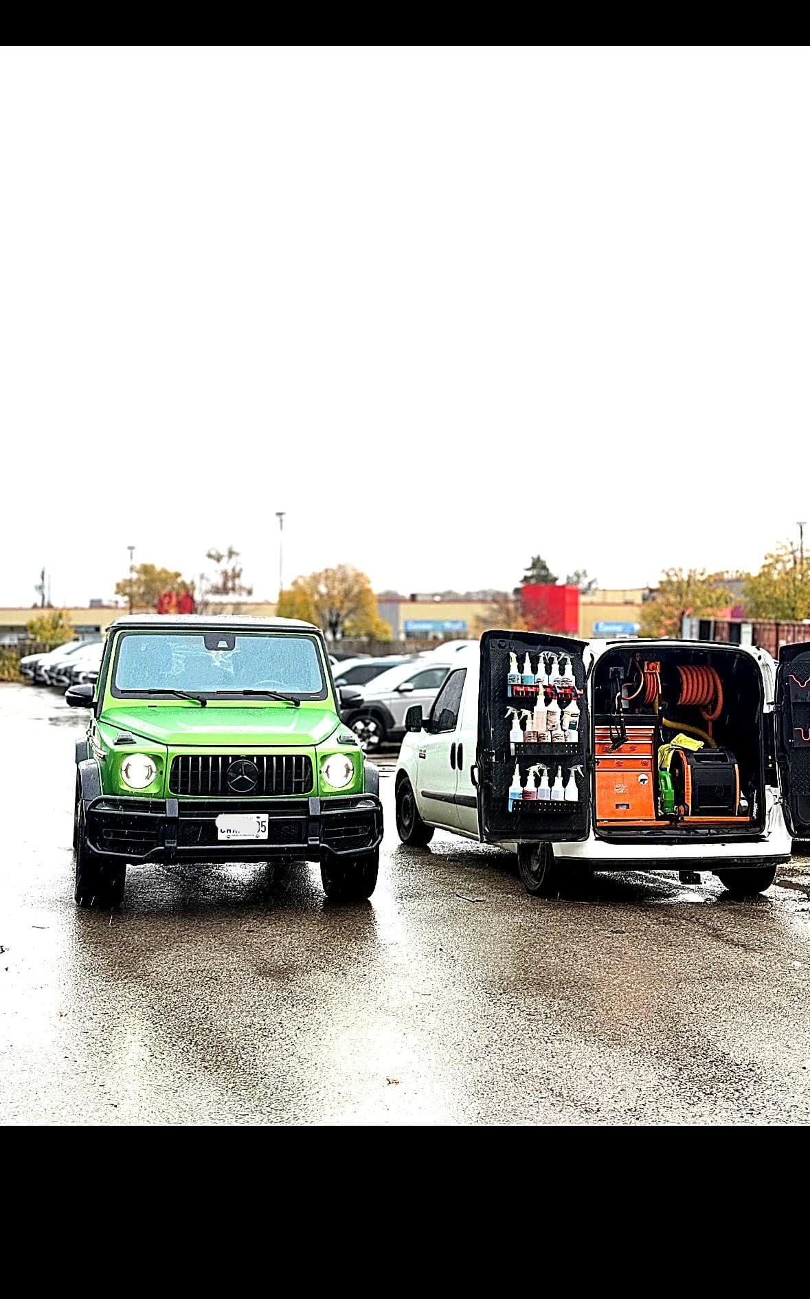 Bright green Mercedes G-Wagon parked next to a fully equipped mobile detailing van.
